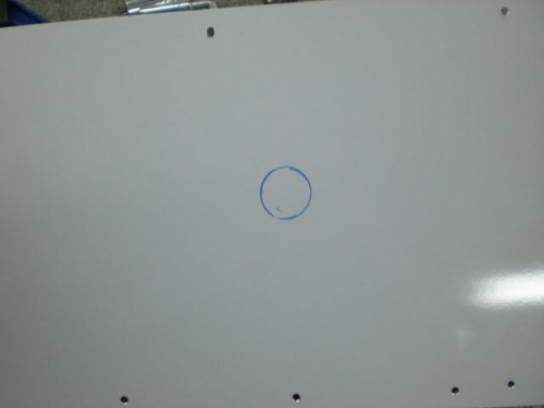 Hole for fuel valve marked in cover