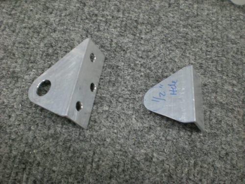 Parking brake cable brackets