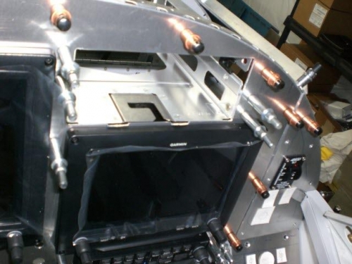 Brackets drilled to prototype panel