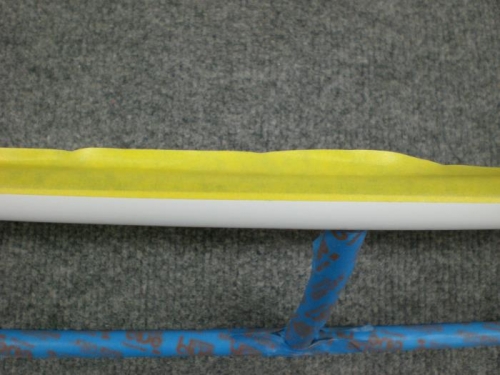 See black under yellow tape..about 1/16 overlap