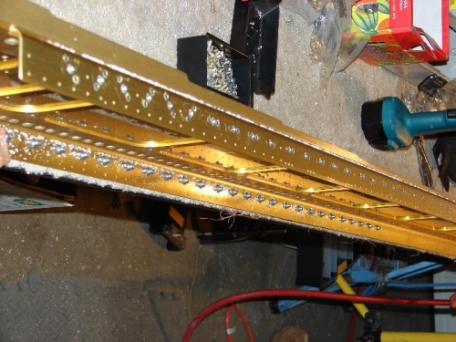 Riveting the platenuts on