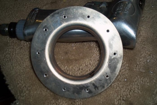 Fuel cap flange all holes deburred