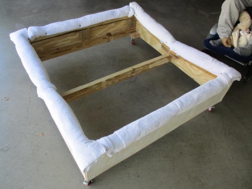 Cradle with casters built out of crate parts