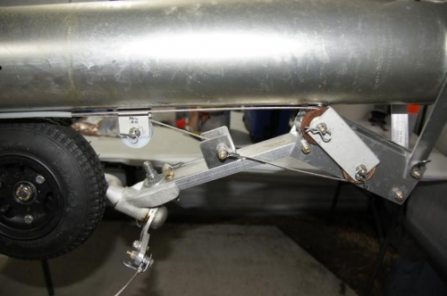 Tailwheel connection to steering, retraction, and extension.