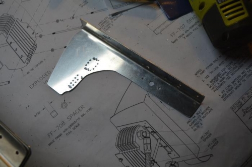 Extra brace for oil cooler mount