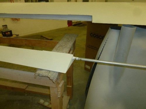 Bolts face forward for clearance.