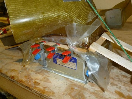 Plasic and tong depressors to hold in place