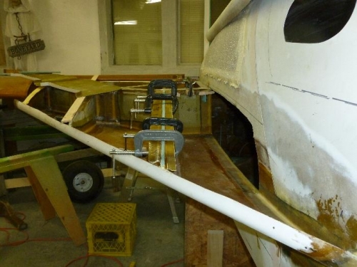 The flange on the right is being attached