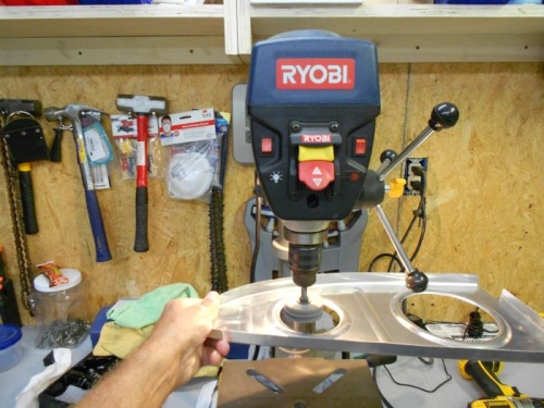 Used a drill press with scotchbrite wheel for holes