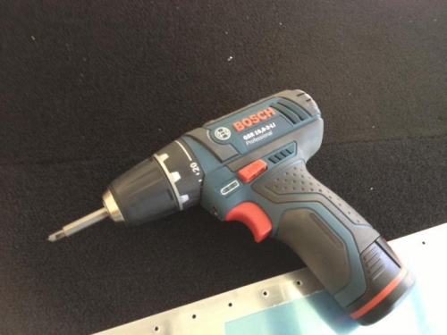 Trusty Bosch E Screwdriver/Drill with Cleaveland Deburring bit.