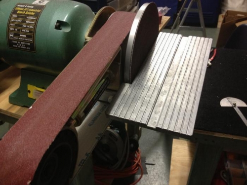 Linisher table was offset to clean them up.