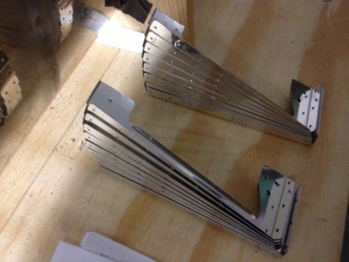 Two piles of partially completed E-1008Bs