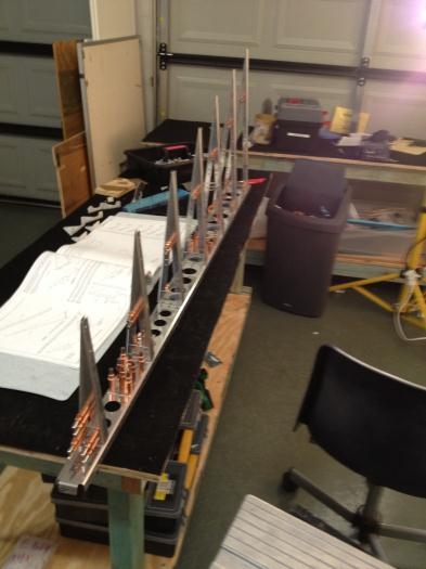 Spar Web drilled for Shear Clips and doublers.