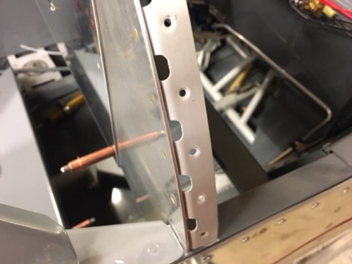 flange riveted to sub-panel