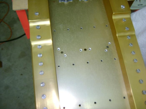 Drilled and countersunk holes