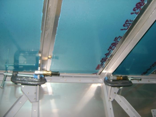 Inboard stiffeners clamped for drilling
