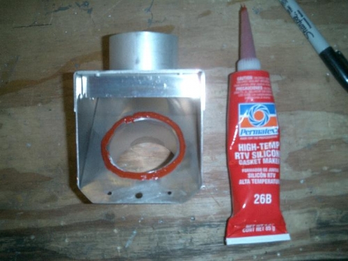 Ring of red RTV to form gasket