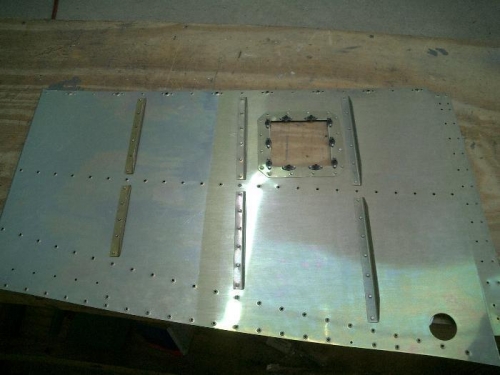 Stiffners and access panel on left baggage floor.