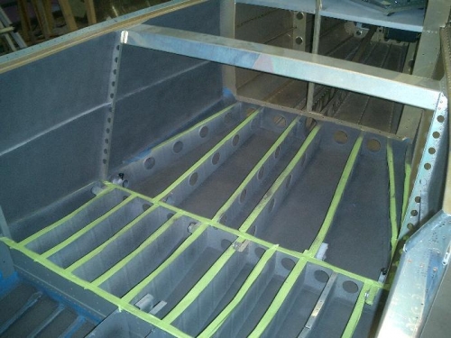 View into the seat and baggage compartment wells.