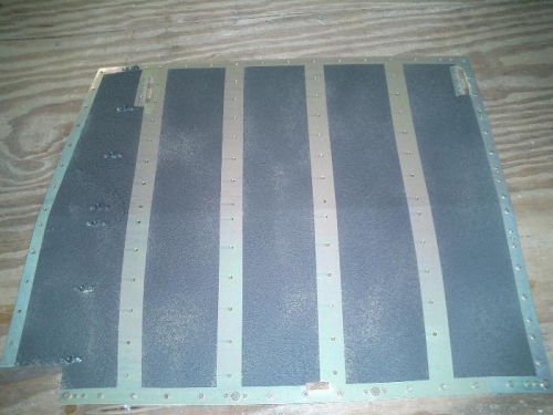 Tape removed from the rivet lines on one of the seat pans.