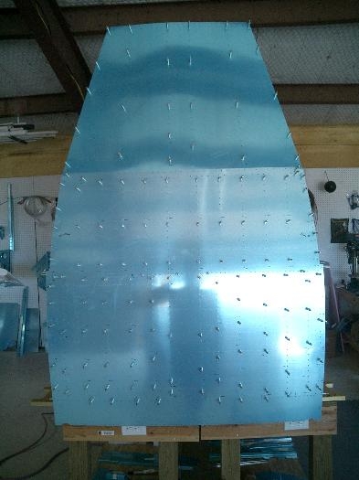This is the bottom of the mid fuselage with skin clecoed.  Top is the end that connects to tailcone.