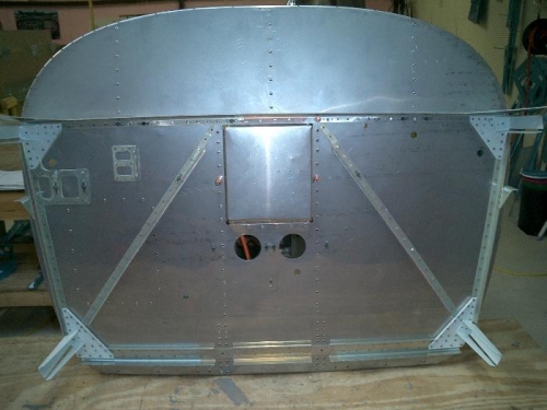 Aft side of firewall with parts riveted on.