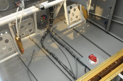 Wire routing via the tunnel.