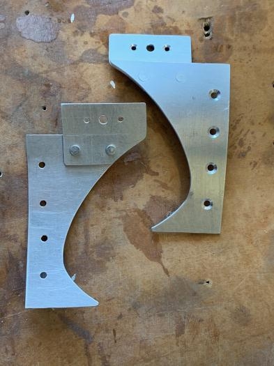 Backing plates between spinner plate and prop