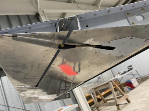 Tab connected to actuator