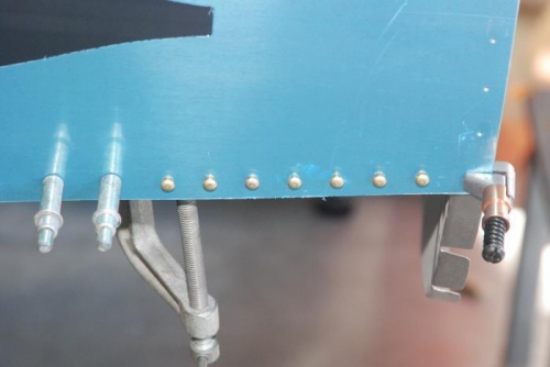 Temporary #4 rivets holding in place