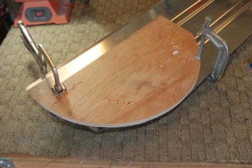Plywood form for the quarter-circle arc.