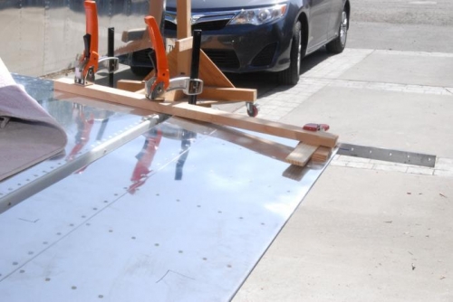 Aileron clamped in position