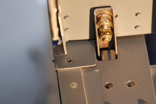 Latch weldment in locking hole