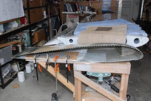 Clamping stiffener layup in place.