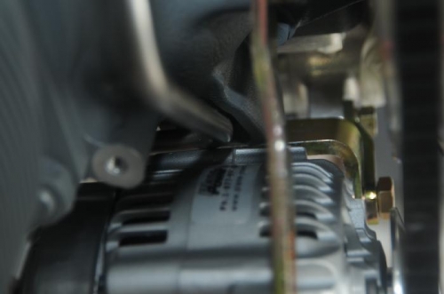 Alternator butting up aginst oil line