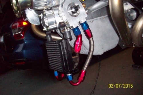 First custom hose in place between adapter and radiator.