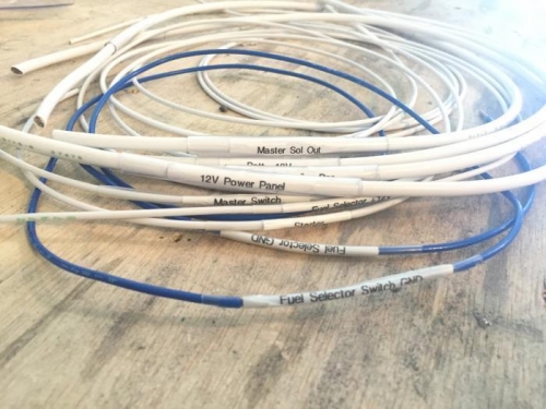 Examples of pre-cut wires with labels on each end.