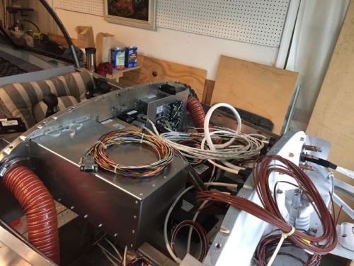 From the passenger side looking aft: Engine monitoring cables in the foreground.