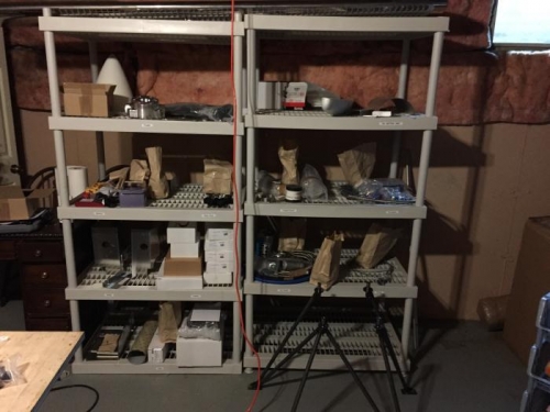 Shelves filled back up with engin and avionics parts.