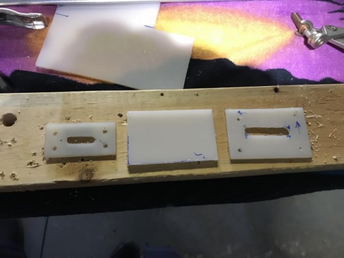Original flap control plate (L), new template (middle), right flap control plate (R).