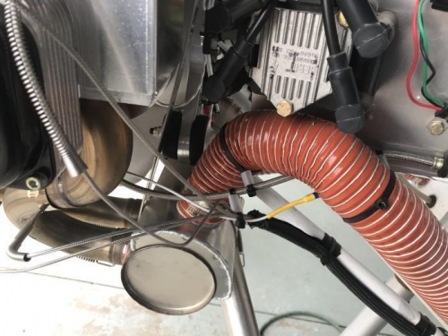 Heater hose with spacers installed with engine oil pressure hose.