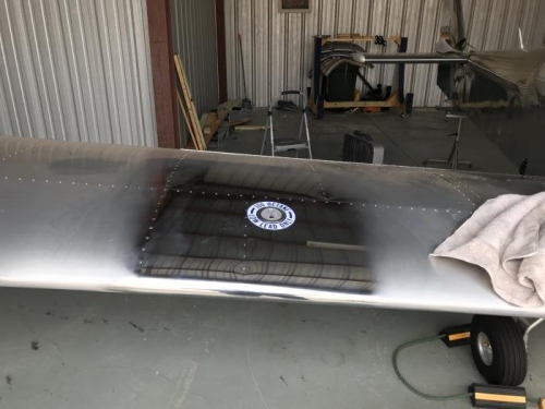 Right wing 100LL placard in place after polishing.