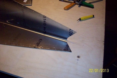 The curved top of the rudder nose skin which mates to the plastic tip rib.