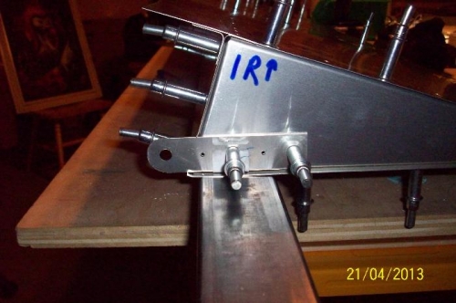 The aileron horn flush with the inboard end of the aileron.
