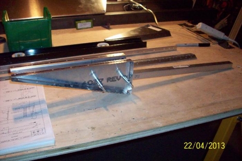 A test assembly of the balance bar section. The bar extends at a 94 degree angle from the aileron.
