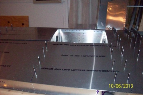 Wing locker cut out in the top skin viewed from the back of the wing.