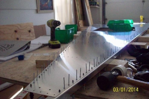 The bottom fuselage skin while riveting.