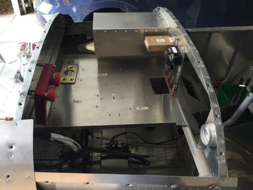 The avionics shelf riveted in place (note the two new rivet lines marked near the center).