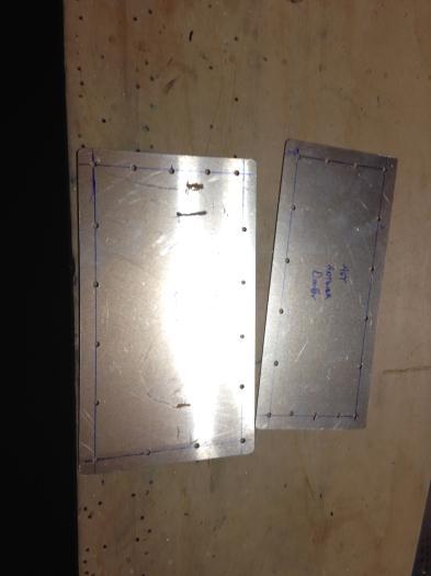 The two rear top skin doublers after being drilled out.