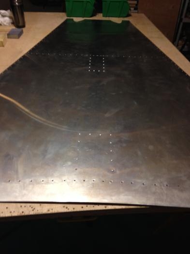 Outside of rear top skin with the skin doubler rivet lines showing.